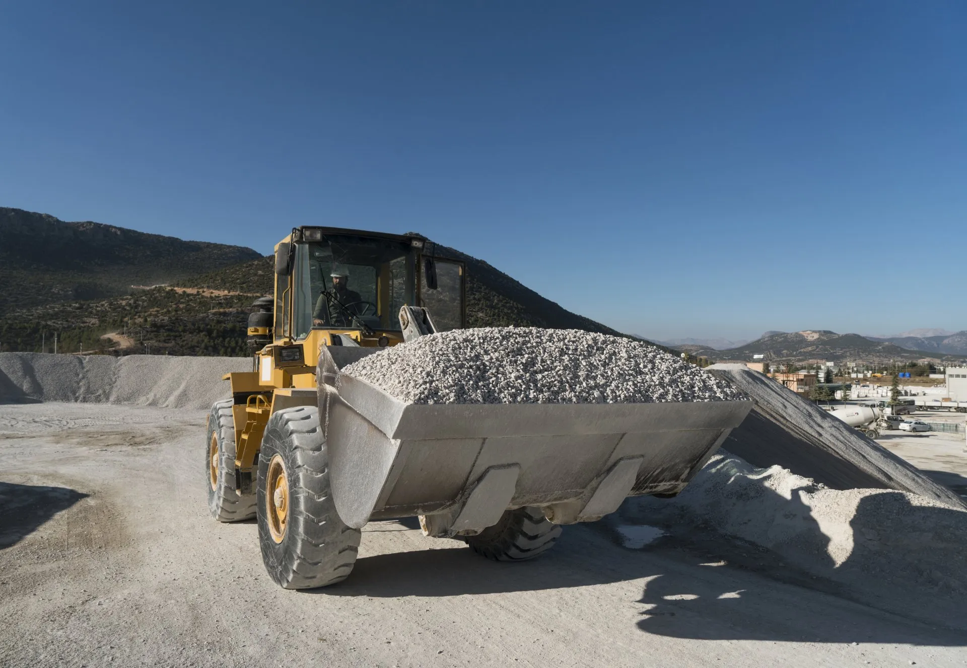 Images of earthmover with crushed stone